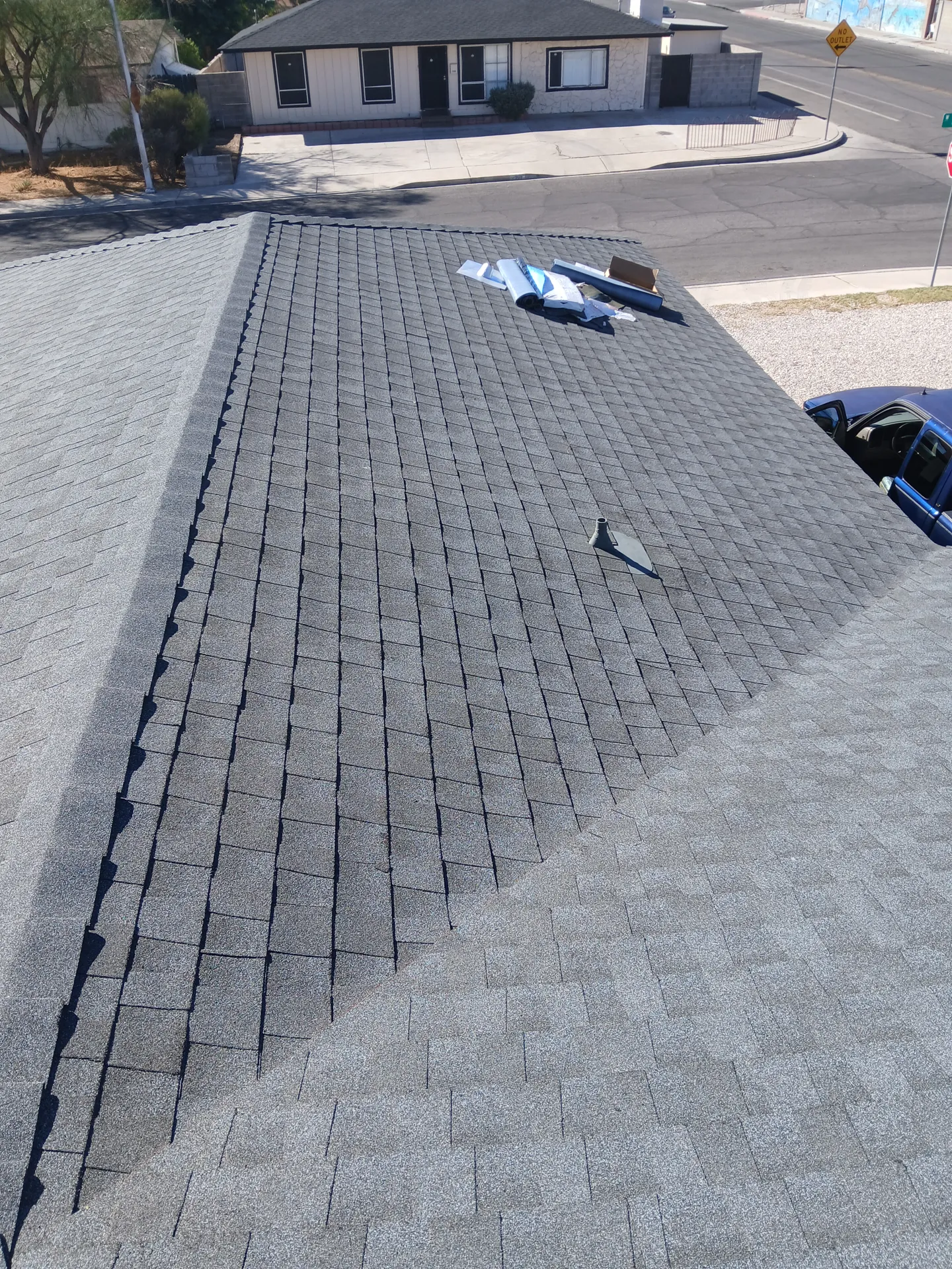 Finished gray shingle roof by Lopez Roofing